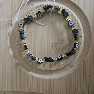 Jelly's Jewelry and Boutique Handcrafted Black and Yellow Floral Beaded Bracelet